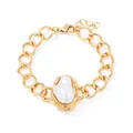 Elegant vintage gold link chain bracelet featuring a large white baroque pearl centerpiece - Bracelet / Gold