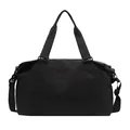 Detail view of black large capacity travel duffel bag with sturdy shoulder straps - Black