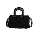 Frontal detail view of a black fluffy handheld bag with a leather handle and strap - Black