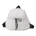 Macro detail of a plush white faux fur backpack with black functional drawstrings - White