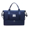 Navy blue quilted fitness duffel bag featuring a separate bottom storage shoe compartment - Blue