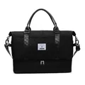 Front view of black quilted travel duffel bag featuring a separate shoe compartment. - Versatile Black