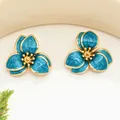 Elegant blue marbled enamel flower stud earrings with gold-toned metal petal accents - Earrings / Blue