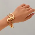Elegante bracciale rigido geometrico irregolare in metallo dorato per donne alla moda - Stile 4 / Oro
