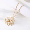 Elegant gold necklace featuring a white enamel flower pendant for forest style fashion - Necklace / White
