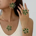 Elegant green enamel flower jewelry set with gold-tone finish on an Asian female model - Set / Green