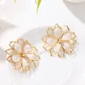 Elegant white enamel flower earrings in gold-toned finish for women, variant product view - Earrings / White