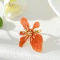 Artistic orange enamel flower ring with golden stamen detail for women summer look - Ring / Orange