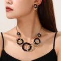 Elegant black enamel and gold circular interlocking necklace and earrings jewelry set - Interlocking Ring Necklace and Earrings Set (28DYXT) / Black