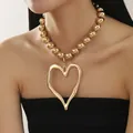 Exaggerated gold bead necklace with large irregular hollow heart pendant for women - Metal Ball Chain Style / Gold