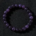 Natural purple crystal beaded bracelet with round stone beads on black texture - Purple Mica Style (Model 2026316 Style 21)