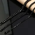 Detail shot of three different widths of black stainless steel Cuban link chains - 3mm Bracelet / 18cm+5cm / Black