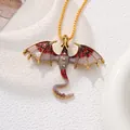 Detail of vintage red enamel dragon pendant with sparkling rhinestones and gold chain. - Dragon Necklace / Red