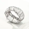 Chunky silver wide bangle featuring an irregular pleated texture design in minimalist style - White K/Silver