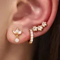 Elegant gold-plated hoop and stud earring set featuring sparkling cubic zirconia stones - Clover and Star 3-Piece Set (82TED) / Gold