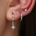 Stylish silver-finished earring set featuring a star charm hoop and stud on human ear - Minimalist Star 3-Piece Set (82TED) / Silver