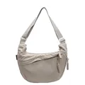 Detail of minimalist beige dumpling crossbody bag with adjustable white shoulder strap - L / Off White
