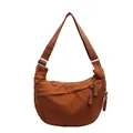 Front detail view of a brown casual dumpling crossbody bag with braided rope zipper pulls - L / Brown