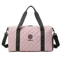 Stylish pink quilted travel duffel bag with black straps and NINGJIA logo for gym use - Pink