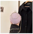 Elegant lavender round evening clutch bag featuring glitter finish and rhinestone circular handle - Pink
