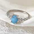 Elegant vintage style blue oval faux opal moon ring with sparkly crystal accents - Size 6 / Silver/Blue Zirconia
