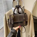 Elegant dark brown suede saddle bag for women with decorative white stitching detail - Brown No Pendant