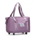 Large capacity purple foldable luggage travel bag featuring four durable swivel wheels - Purple