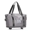 Large capacity foldable grey trolley travel bag with four wheels and shoulder straps - Gray
