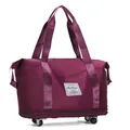 Large capacity purple travel bag with wheels and water-repellent material - Deep purple