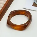 Irregular amber resin bangle with marbled swirl pattern and high polished finish - Amber Inked Style (15 Deep Brown 36) / Dark Brown