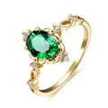 Elegant gold ring featuring a large oval green zircon center stone with side accents - Size 9 / Gold Green Zirconia