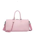 Detail of pink crocodile texture travel bag with shoulder strap and chain - Light Pink