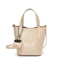 Minimalist beige bucket bag with top handle and crossbody strap, vegetable basket style - White