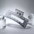 Detailed view of the large square gradient grey hair claw clip with diamond quilted texture - Glossy Gradient Black