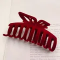 Detailed view of a wine red flocked butterfly bow hair claw clip with velvet texture - 11 Butterfly Skeleton Style / Burgundy