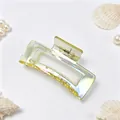 Elegant iridescent yellow hair claw clip with electroplated finish shown in detail - Iridescent Champagne