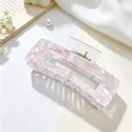 Detail of rectangular acrylic hair claw clip with purple floral flake patterns. - Square Patchwork Style / Floral Purple