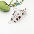 Detailed view showing the leopard print pattern on a clear flat shark hair clip - Glossy Transparent Tortoise Leopard