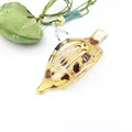Macro view of a large leopard print duckbill hair clip with transparent amber resin - Glossy Light Tortoise Leopard