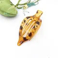 Close-up of flat tortoiseshell hair clip with elegant leopard pattern detail - Glossy Dark Tortoise Leopard