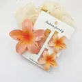 Three-piece set of sweet plumeria flower hair claw clips for summer holiday styling - 3-Piece Set (1 Large 2 Small) / Orange And Orange