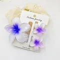 Detailed set of three purple gradient frangipani hair clips on a white display card. - 3-Piece Set (1 Large 2 Small) / White and Purple
