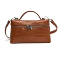 Elegant brown crocodile-embossed box handbag with top handle and silver hardware - Brown