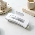 Detailed view of a minimalist large white square hair claw clip on aesthetic stone props - 10.5cm Square / Matte Pure White