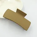 Close-up of a large matte square hair claw clip in a solid earthy olive green finish - Medium Coffee