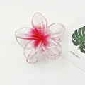 Detailed macro view of the pink gradient transparent frangipani flower hair claw clip - Frangipani Style / 8cm / Transparent Red