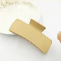Detailed side view of a large solid matte square hair claw clip in beige finish. - Khaki
