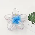 Close-up of a large plumeria flower hair claw clip in gradient blue and purple - Frangipani Style / 8cm / Transparent Blue