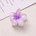 Detailed close-up of a 4cm purple gradient plumeria flower hair claw clip for women - White + Purple