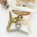 Detailed macro shot of four translucent jelly large shark hair claws in earth tones. - Pack of 4 / White and Gray and Green and Coffee